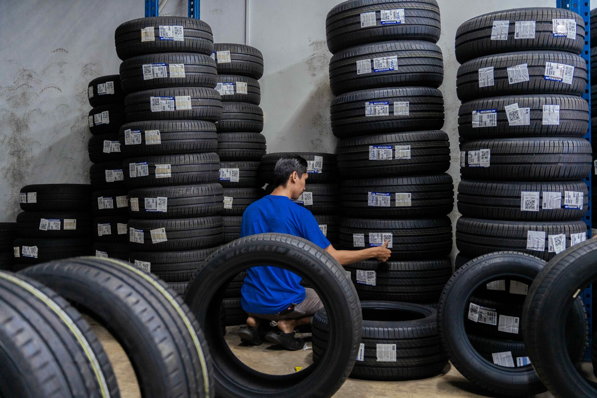 Inside a Tayarlo warehouse — Michelin stock checked at the racks